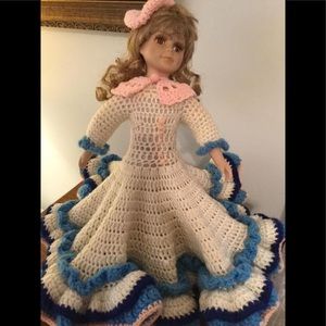 Antique Doll in hand crocheted winter garments